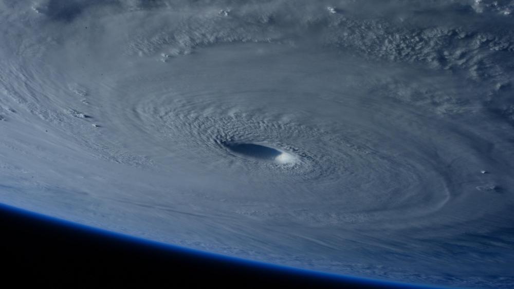 Space Station Flies Over Super Typhoon Maysak wallpaper