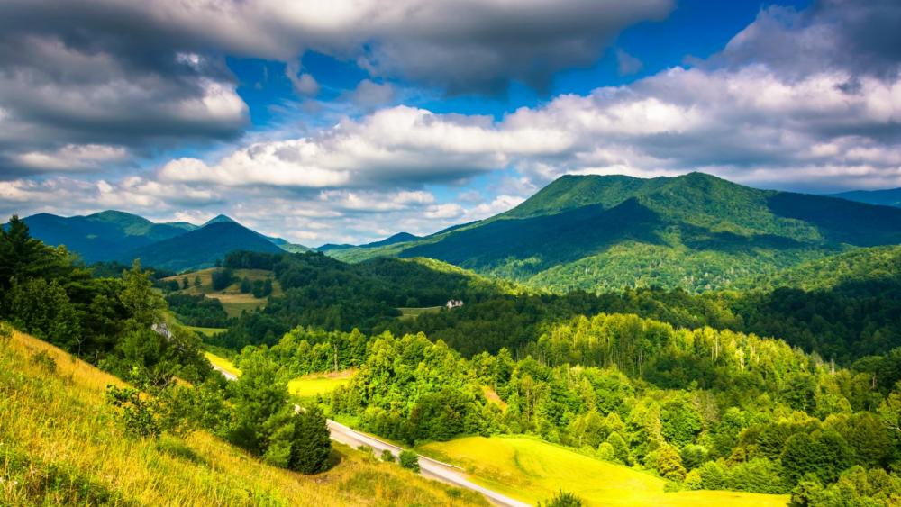 Mountain Serenity in Lush Green Hills wallpaper