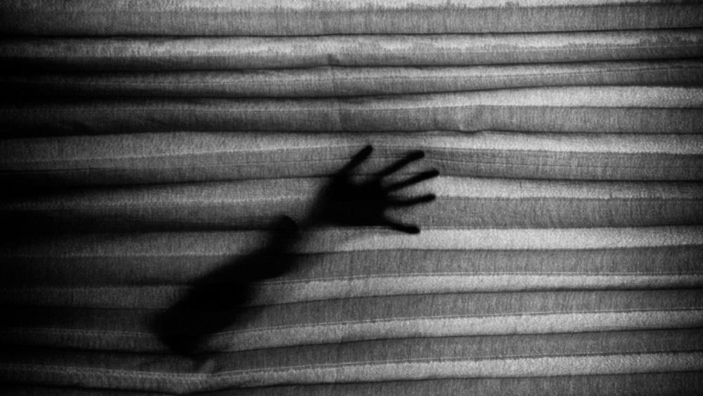 Black shadow of arm wallpaper