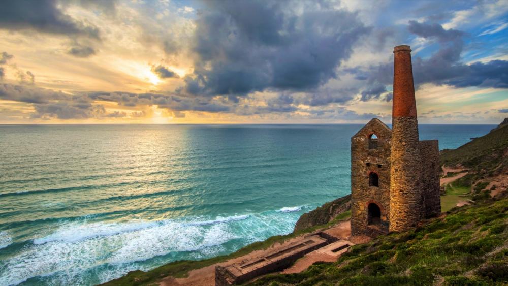 Mystical Seaside Ruins at Sunset wallpaper
