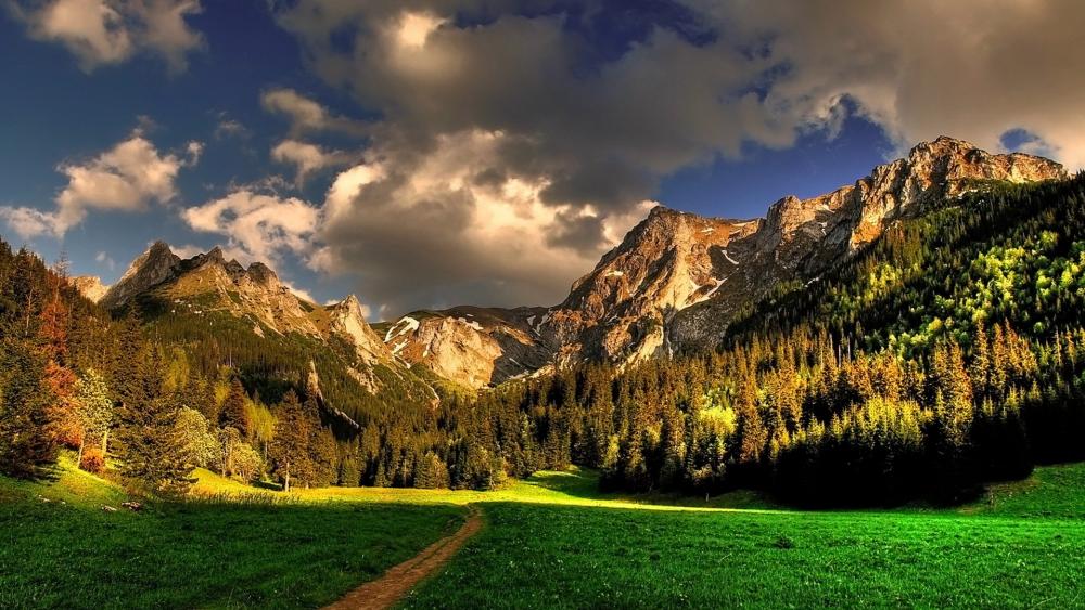 Majestic Mountain Landscape in Golden Light wallpaper