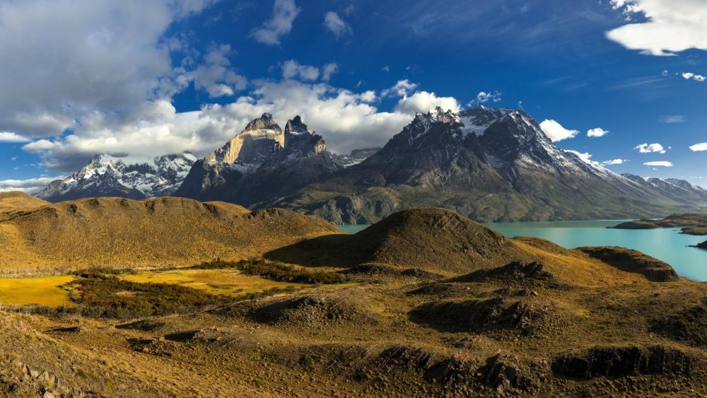 Majestic Mountains and Serene Waters Awaiting Adventure wallpaper
