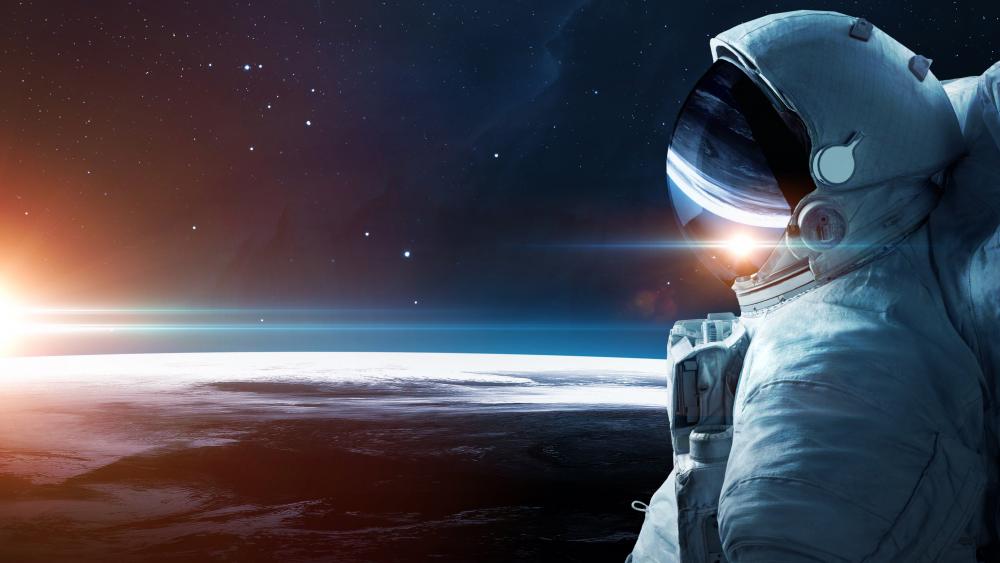 Astronaut Gazing at Earth's Horizon wallpaper