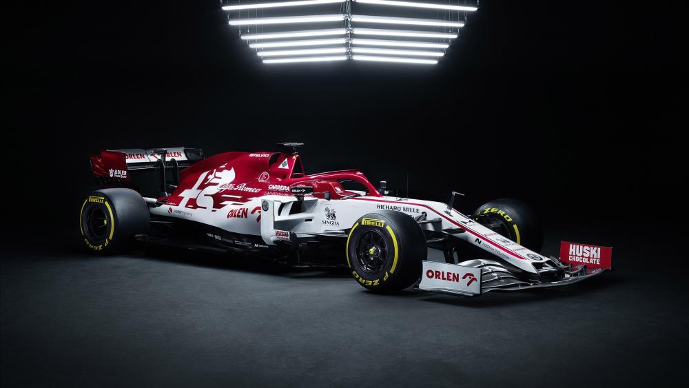 Sleek Alfa Romeo Racing Car in Dynamic Lighting wallpaper