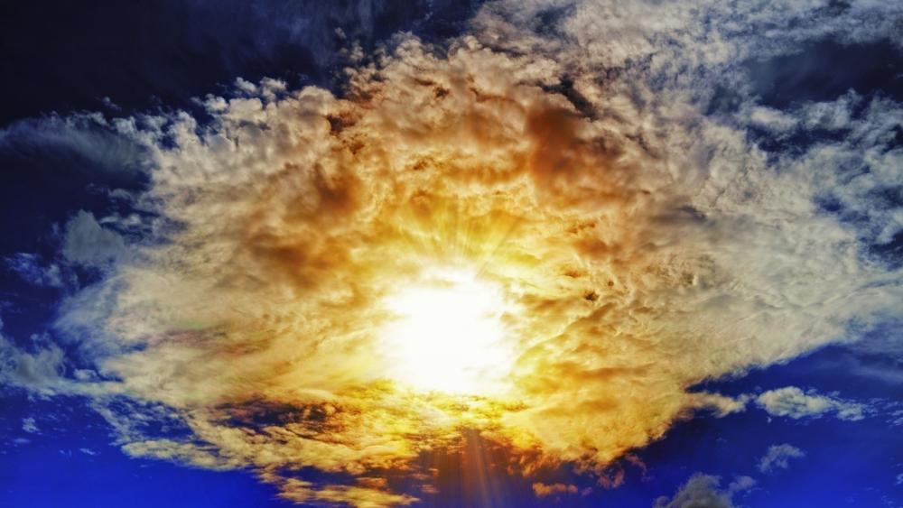 Majestic Sunrise Over Vibrant Clouds wallpaper