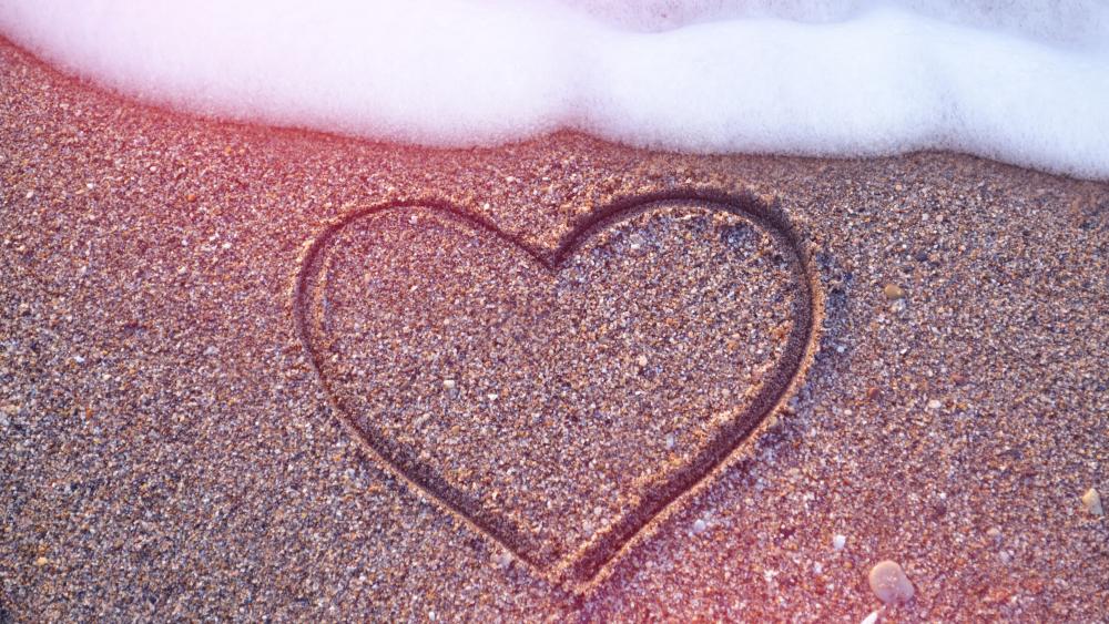 Heart on beach wallpaper