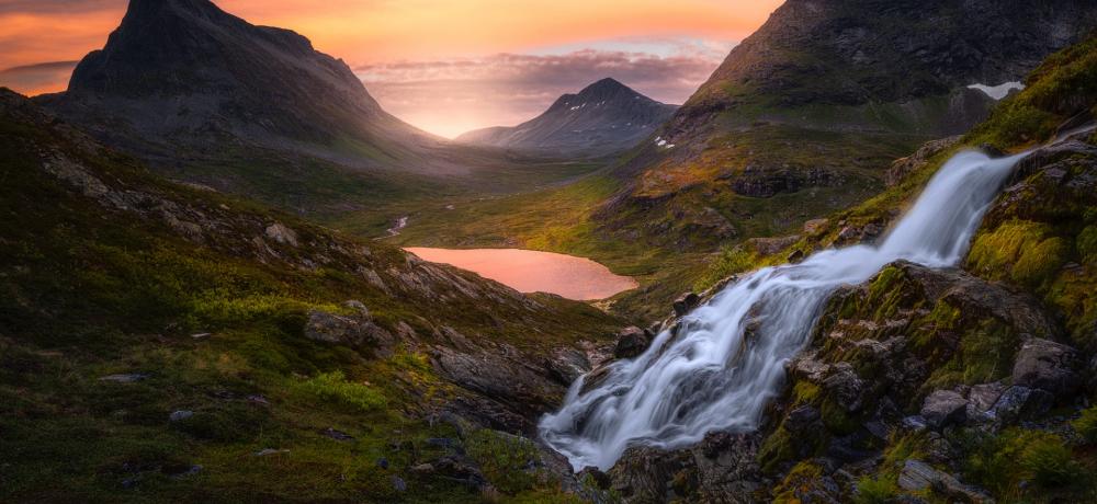 Serene Mountain Valley at Dusk with Waterfall and Lake wallpaper