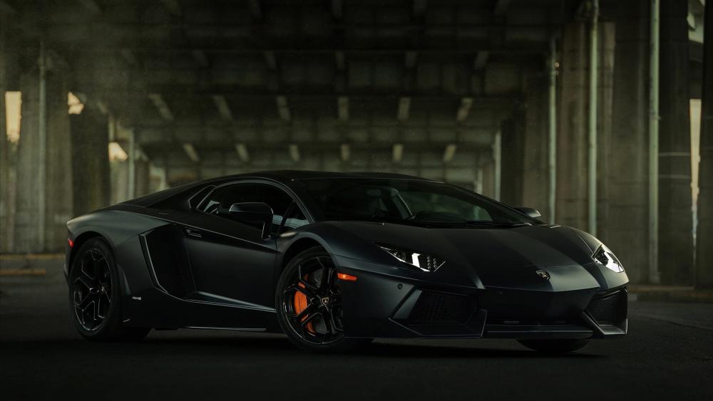 Sleek Black Lamborghini Aventador Wallpaper wallpaper