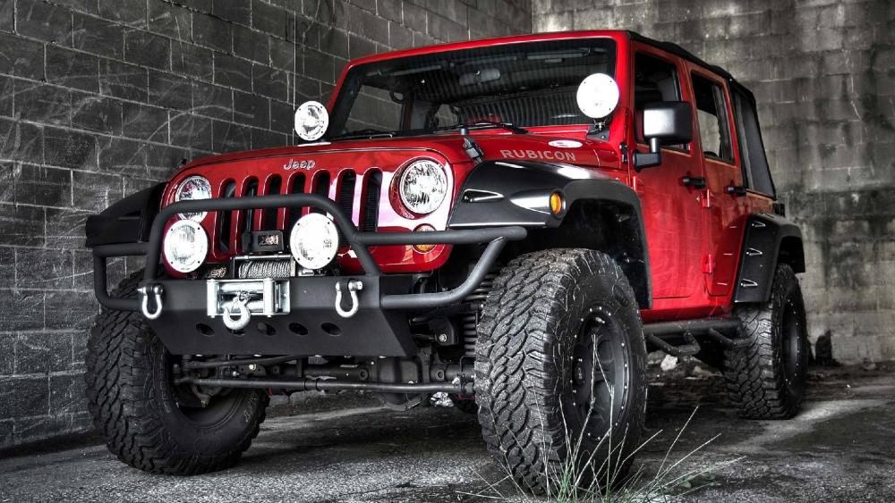 Bold Red Jeep Rubicon on Display wallpaper