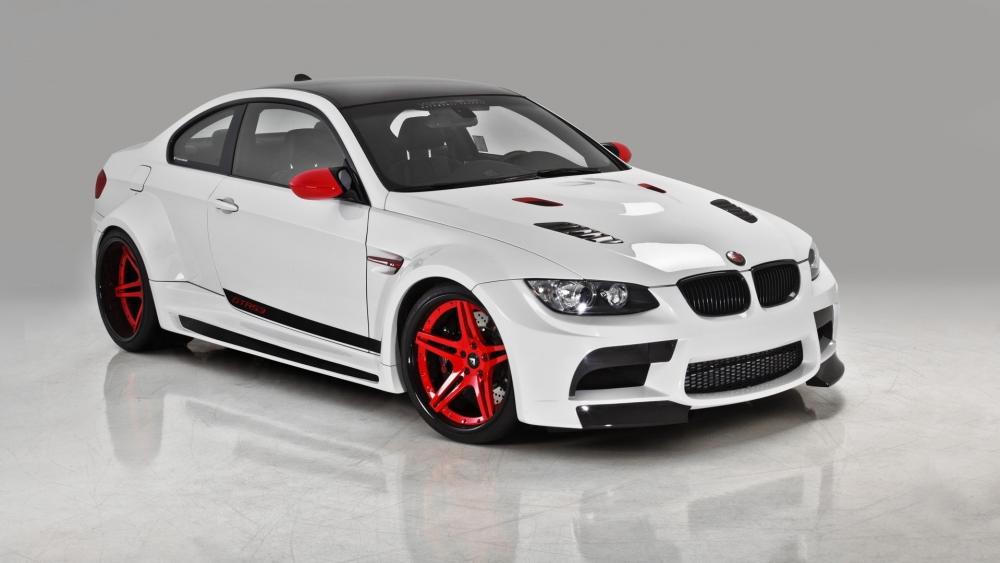 Sleek Red and White Performance Car Wallpaper wallpaper