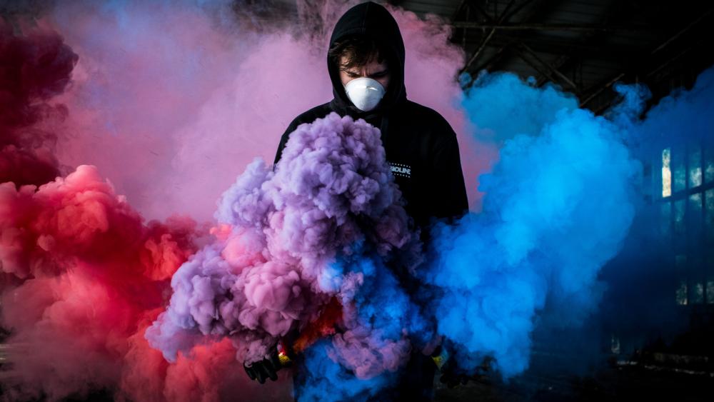 Man play with smoke wallpaper