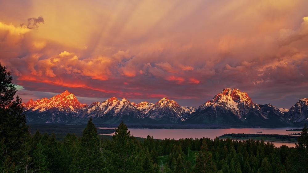Majestic Sunset Over Mountain Peaks wallpaper