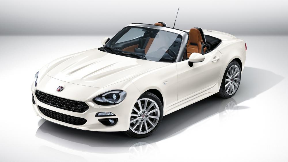 Sleek White Convertible for Stylish Adventures wallpaper