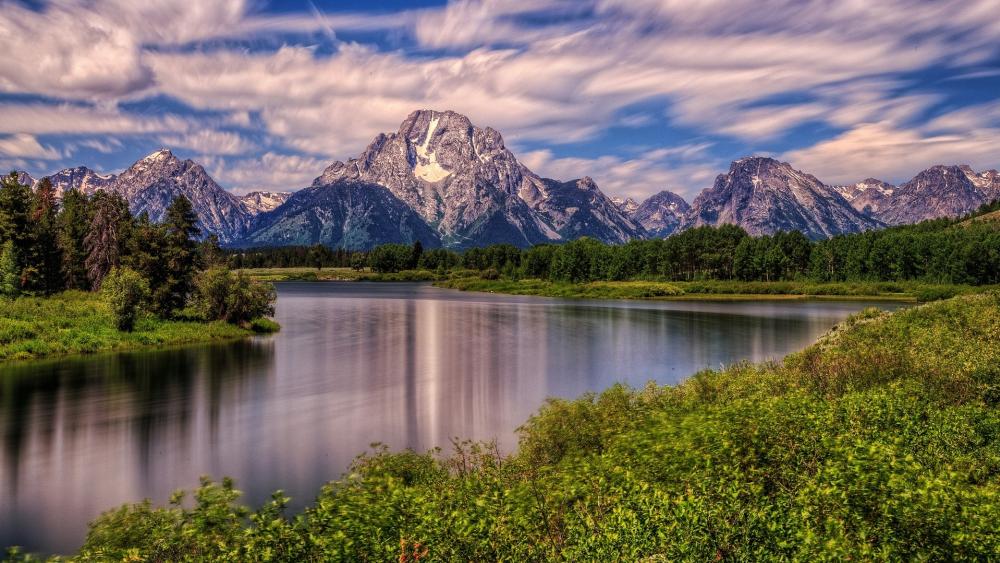 Serenity of Mountains and Reflections in Nature's Beauty wallpaper