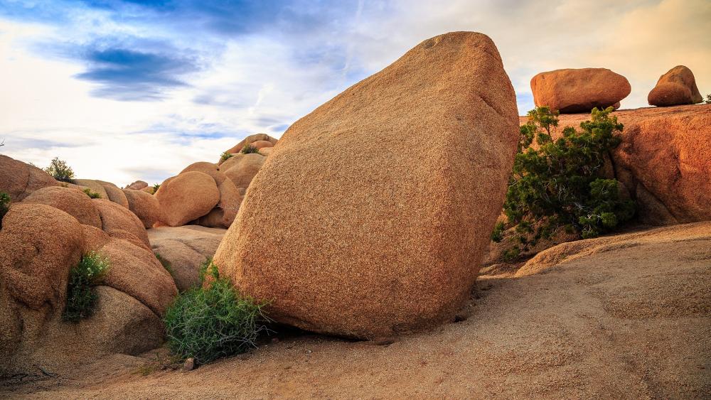Majestic Desert Boulders Under a Blue Sky wallpaper