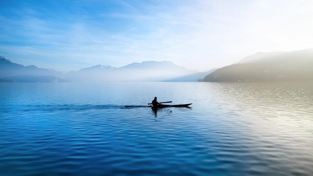 Serene Kayaking at Dawn wallpaper