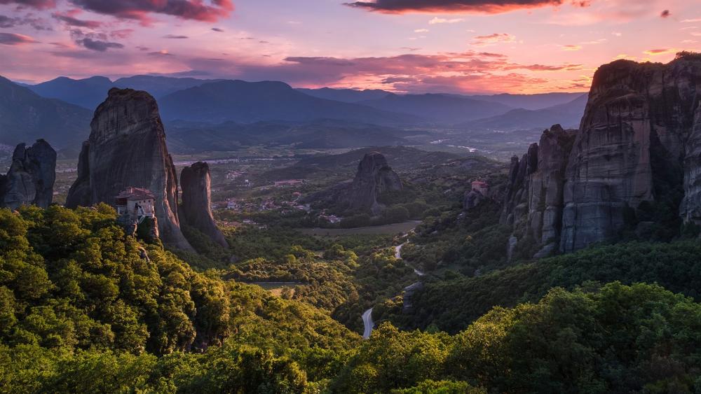 Majestic Twilight Over Mountainous Wilderness wallpaper
