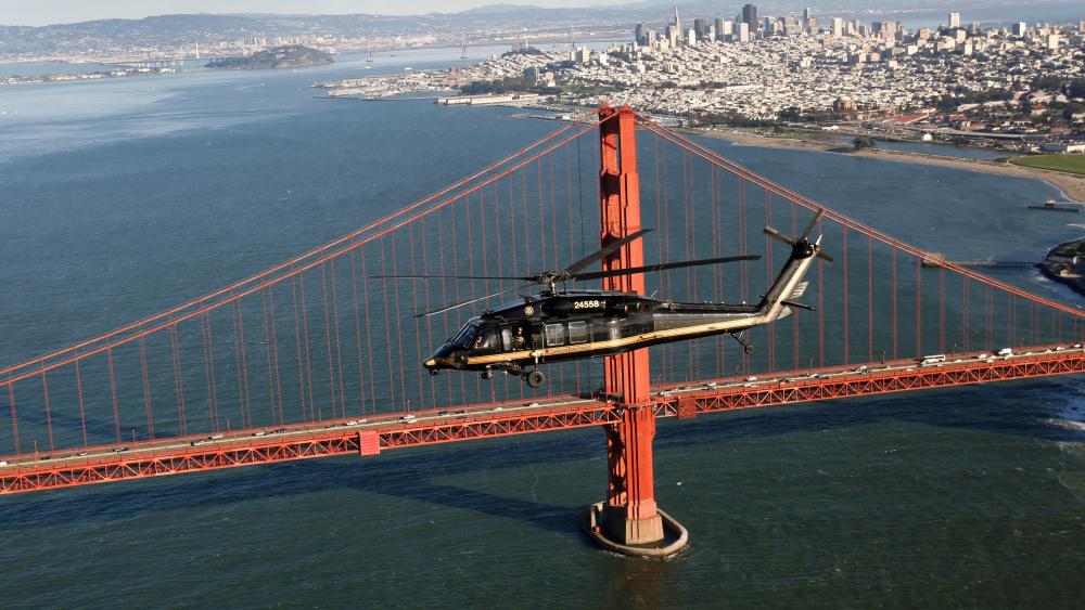 Black Hawk Helicopter Flies Over The Golden Gate Bridge wallpaper