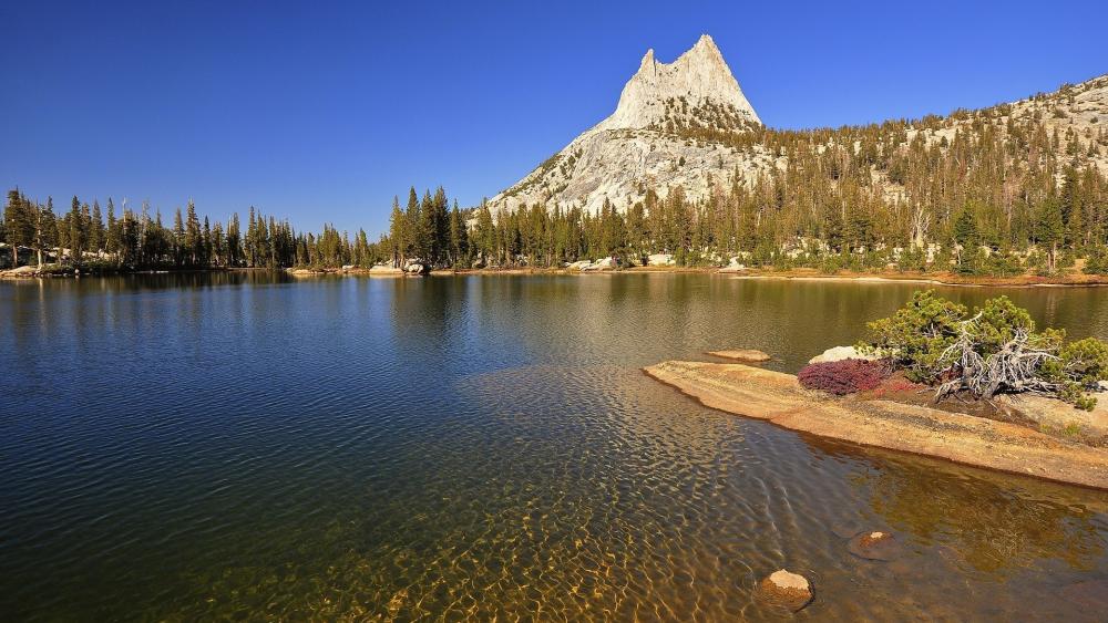 Majestic Mountain Reflected in Tranquil Waters wallpaper