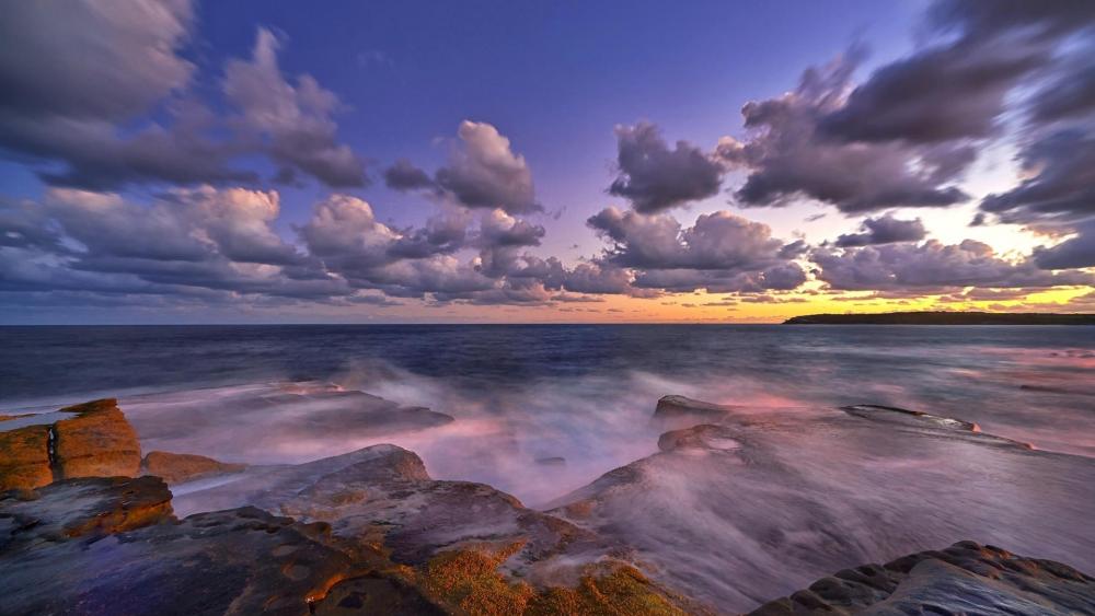Serene Twilight Over Ocean Rocks wallpaper