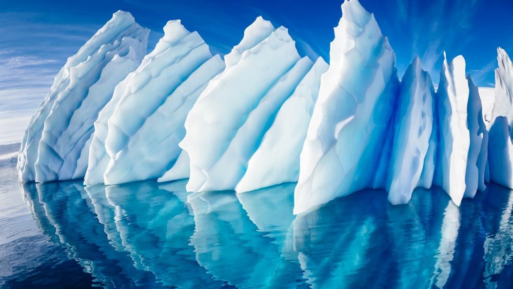 Majestic Iceberg Reflections in Crystal Waters wallpaper