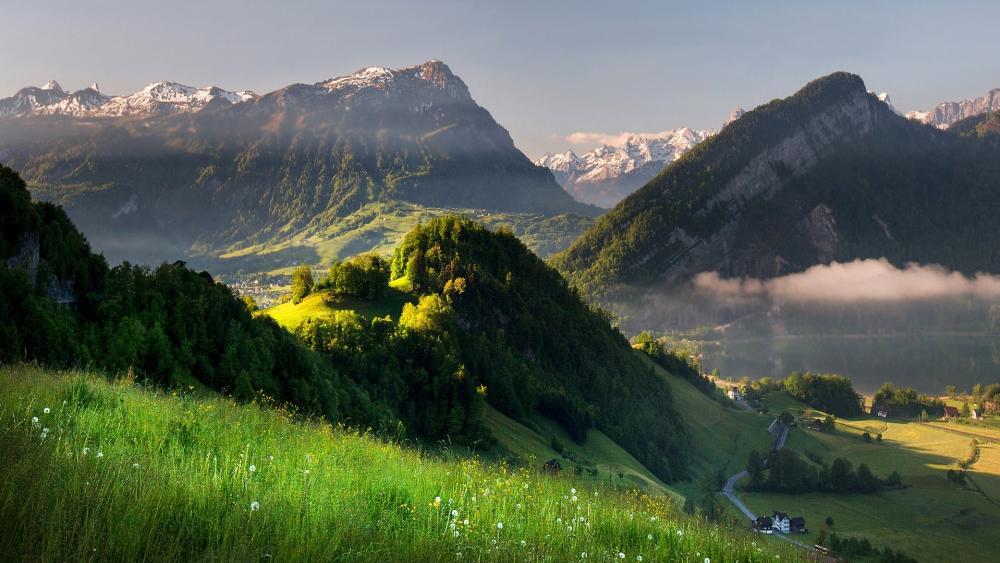 Serene Mountain Landscape in Early Morning Light wallpaper