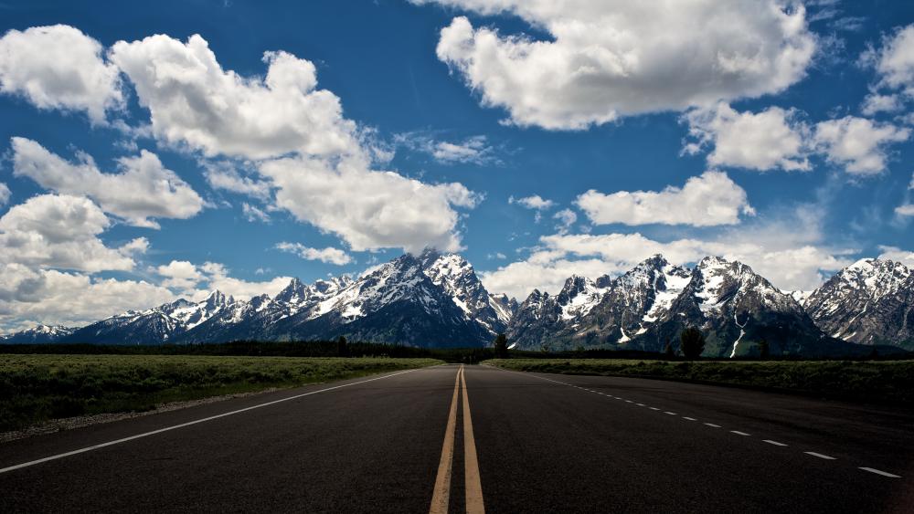 Majestic Mountain Road View in 4K Quality wallpaper