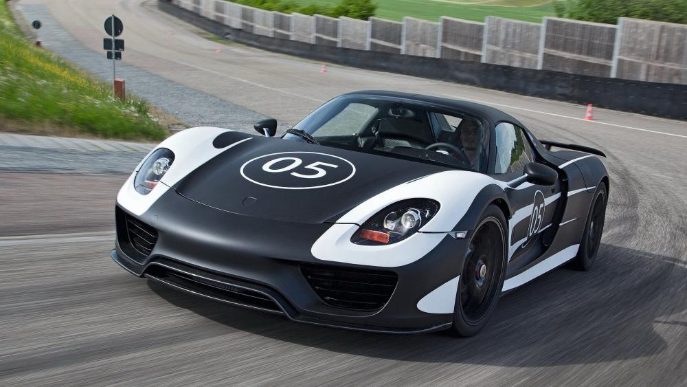 Dynamic Race-Ready Sports Car Wallpaper wallpaper