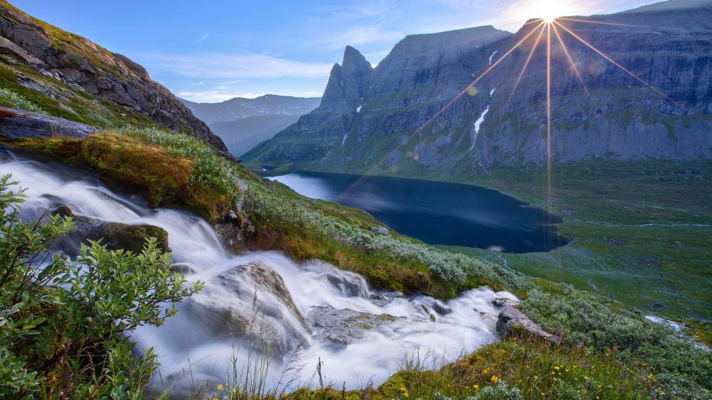 Majestic Mountain Landscape with Serene Waterfall and Lake wallpaper