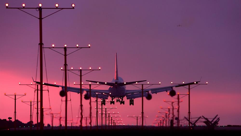 Airplane Landing at Dusk wallpaper