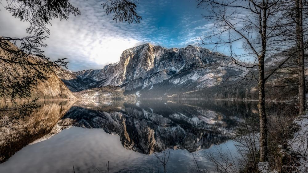 Majestic Mountains Reflected in Serene Waters wallpaper