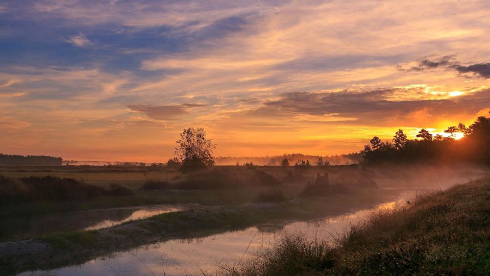 Serene Sunset Over Tranquil River Valley wallpaper