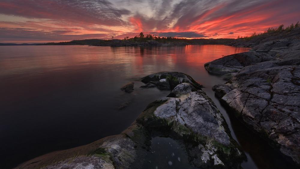 Serene Sunset Over Calm Waters wallpaper