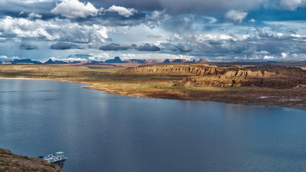 Serene Waters Reflecting Majestic Landscapes wallpaper