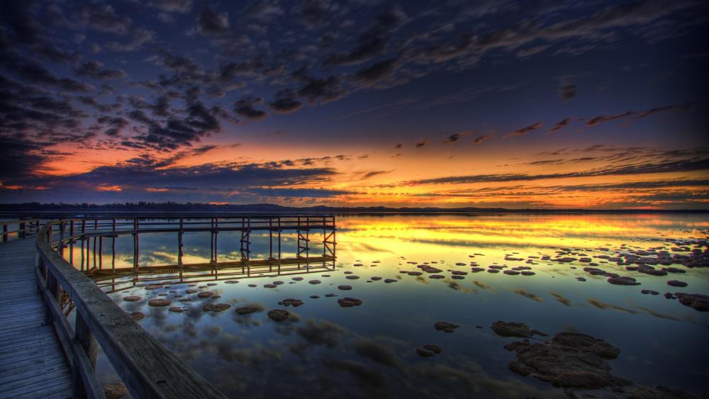 Serene Sunset Over Tranquil Waters wallpaper