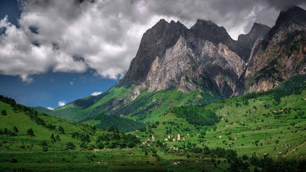 Majestic Mountains and Lush Green Valleys in Nature's Splendor wallpaper