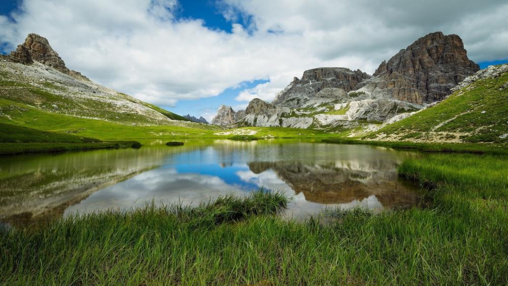 Serene Reflections in a Mountain Landscape wallpaper
