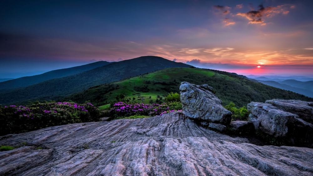 Serene Sunset Over Mountain Landscape wallpaper