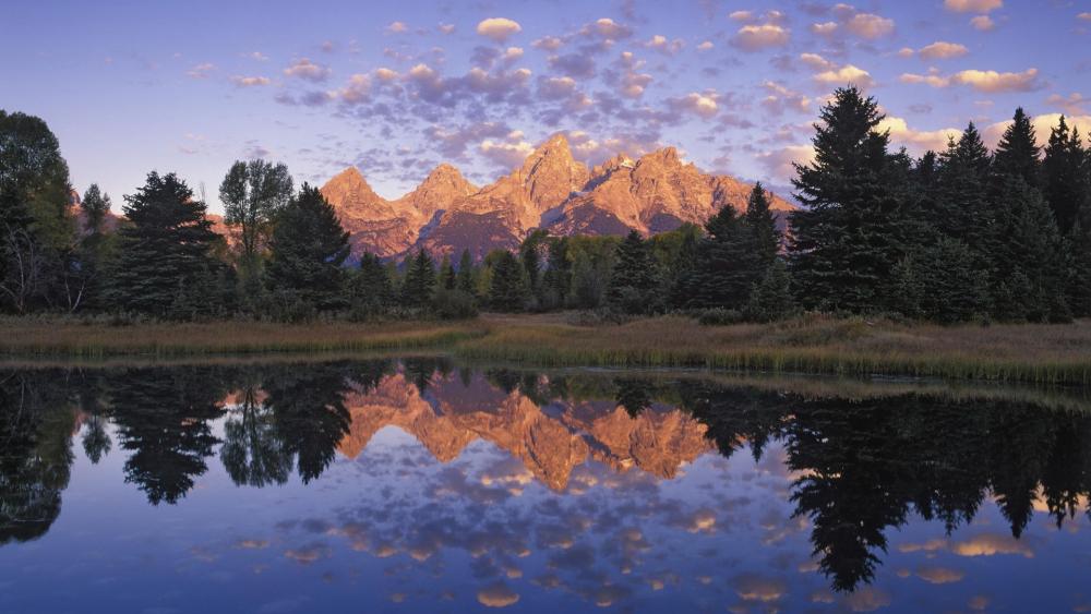 Majestic Mountains Reflected in Tranquil Waters wallpaper