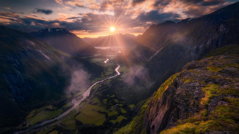 Breathtaking Sunrise Over Majestic Mountains and Valley wallpaper
