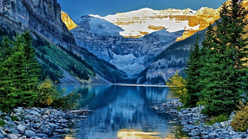 Majestic Mountain Landscape Reflected in Serene Waters wallpaper