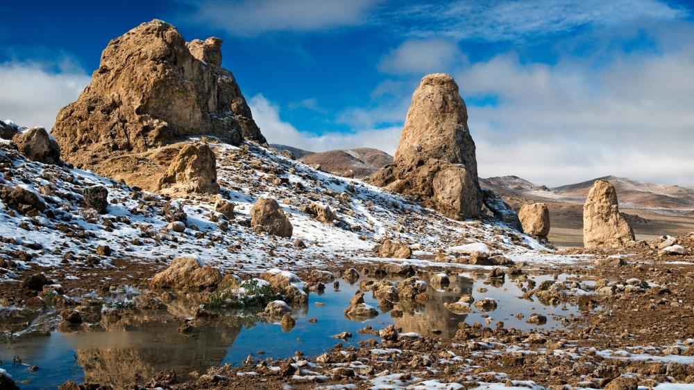 Majestic Rocky Landscape Under a Clear Sky wallpaper