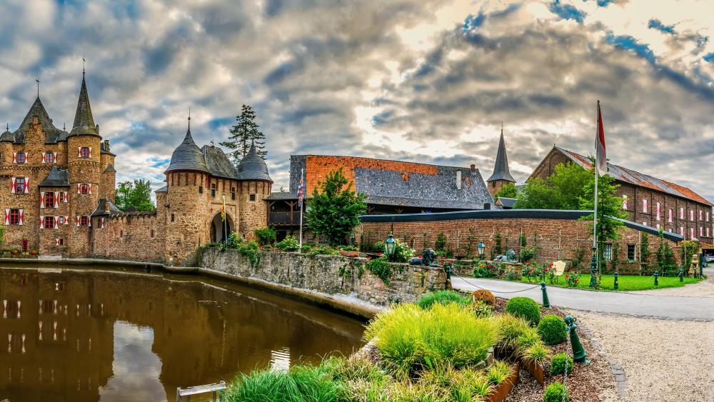 Enchanting Castle Reflections in a Serene Landscape wallpaper