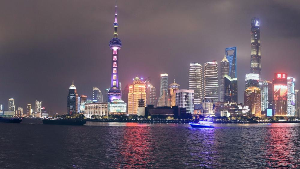 Vibrant Nightscape of Shanghai City Skyline wallpaper