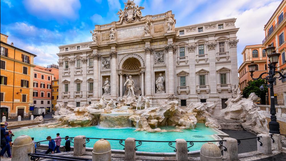 Majestic Trevi Fountain in Vibrant Cityscape wallpaper
