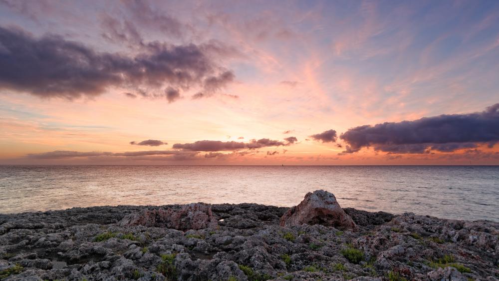 Serene Sunset Over Tranquil Waters wallpaper