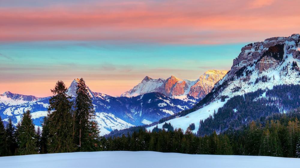 Serene Mountain Sunset View Over Snowy Landscape wallpaper