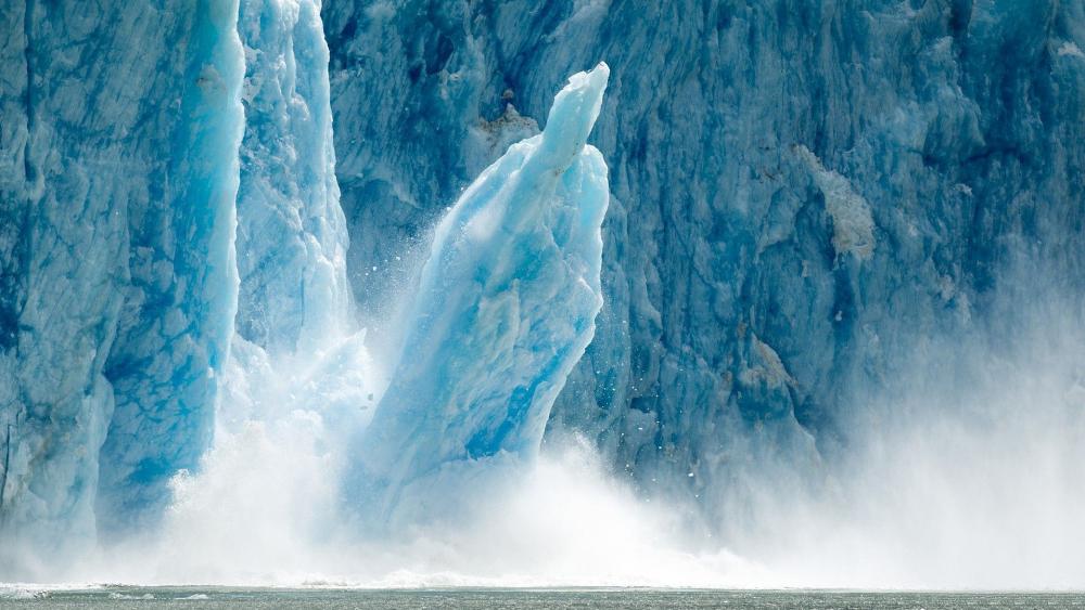 Majestic Glacier Calving Splendor wallpaper