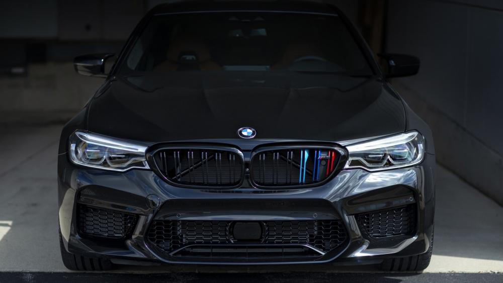Sleek Black BMW M5 Front View Wallpaper wallpaper