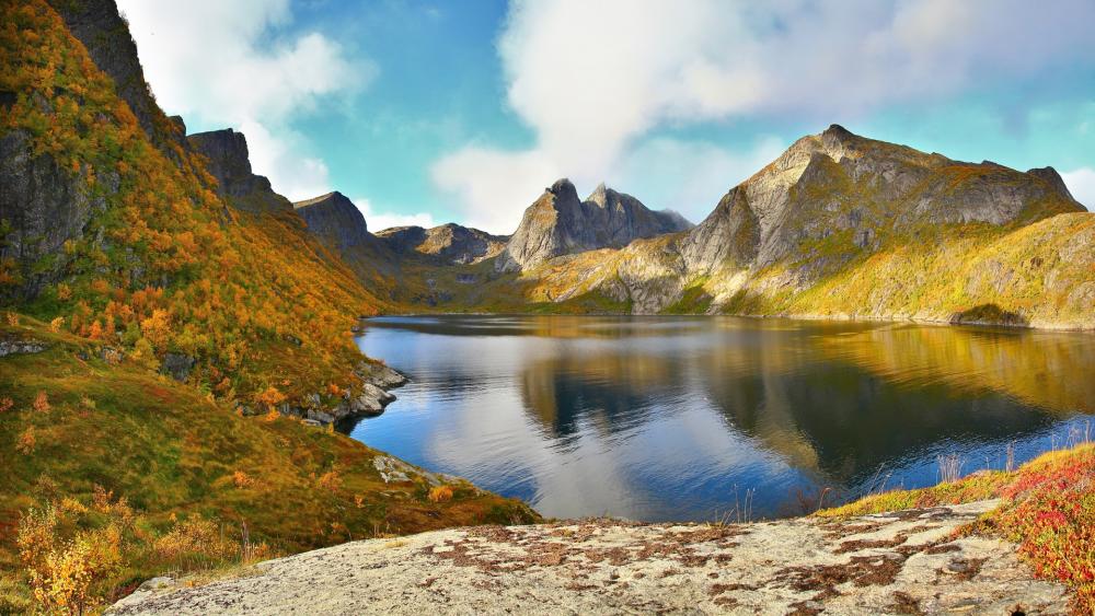 Serene Mountain Landscape Reflected in Calm Waters wallpaper